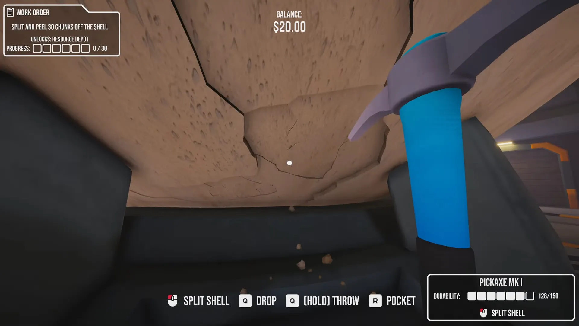 A Pickaxe Mk I held in front of cracked Shell with loose fragments below